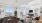 Bright and modern living room with large windows showcasing spectacular views, featuring a cozy seating area, sleek TV setup, and a stylish dining table