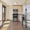 a kitchen with stainless steel appliances	