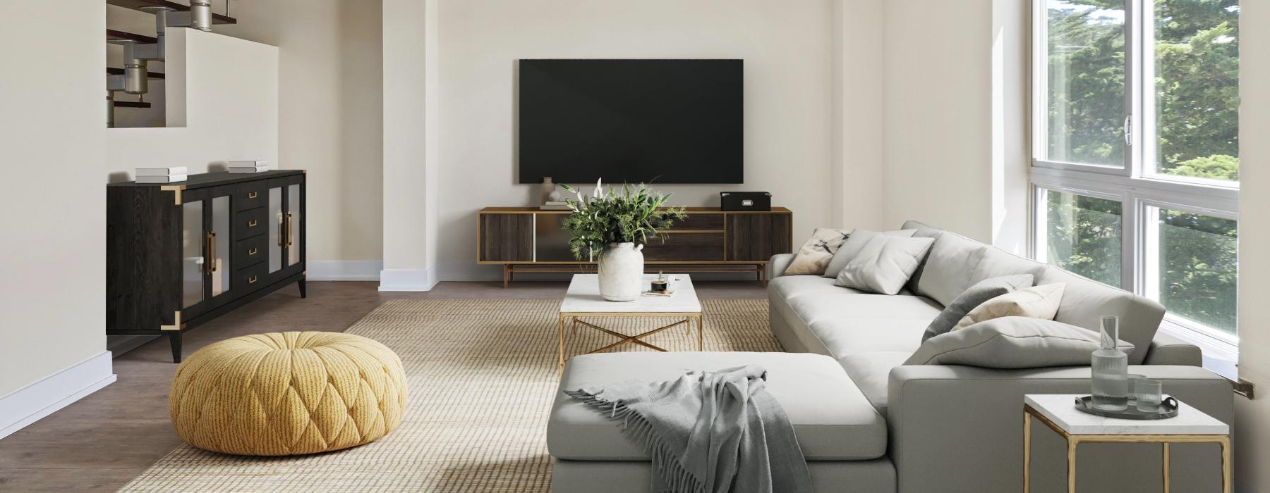 a living room with a tv and couches